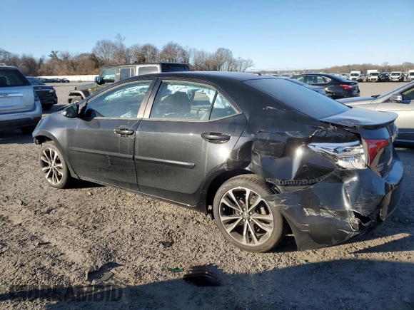 2019 Toyota Corolla L z VIN 2T1BURHE1KC198906, wystawiony jako Copart lot #87813125 z przebiegiem Nie podano mil oraz Nie do naprawy • Non repairable. Historia ofert i sprzedaży dostępna na DreamBid. Obrazek 2.