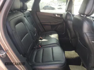 2021 Ford Escape SEL z VIN 1FMCU9H69MUA65731, wystawiony jako Copart lot #59890575 z przebiegiem 113 469 mil mil oraz Czysty tytuł • Clean title. Historia ofert i sprzedaży dostępna na DreamBid. Obrazek 11.