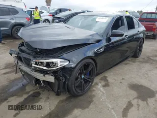 2016 BMW M5 z VIN WBSFV9C54GD595793, wystawiony jako IAAI lot #42101121 z przebiegiem 58 775 mil mil oraz . Historia ofert i sprzedaży dostępna na DreamBid. Obrazek 2.