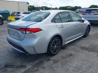 2020 Toyota Corolla LE with VIN JTDEPRAEXLJ023560, listed as a IAAI auction lot 41985501 with 59,529 mi miles. Bid and sale history available at carsss.com. Image 4.