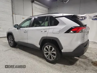 2022 Toyota RAV4 Hybrid XLE Premium with VIN 4T3B6RFV1NU080099, listed as a Copart auction lot 60206905 with 59,859 mi miles and Clean title. Bid and sale history available at DreamBid. Image 2.