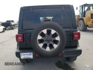 2022 Jeep Wrangler Unlimited Sahara with VIN 1C4HJXEG3NW248021, listed as a Copart auction lot 47555775 with 31,479 mi miles and Salvage Title. Bid and sale history available at DreamBid. Image 6.