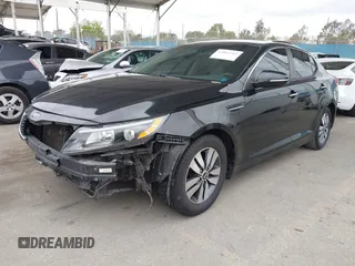 2014 Kia Optima LX with VIN 5XXGM4A7XEG280084, listed as a IAAI auction lot 42063263 with 168,052 mi miles. Bid and sale history available at carsss.com. Image 2.