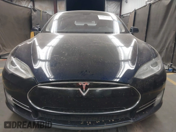 2014 Tesla Model S 60 with VIN 5YJSA1H11EFP56406, listed as a IAAI auction lot 42065157 with Not Provided miles and . Bid and sale history available at DreamBid. Image 12.