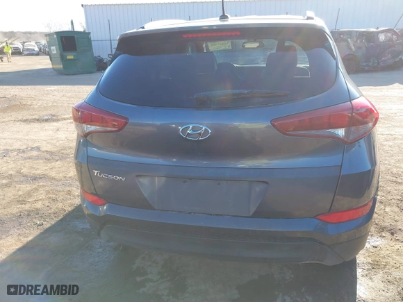 2016 Hyundai Tucson SE with VIN KM8J33A45GU089996, listed as a IAAI auction lot 41687069 with 129,957 mi miles. Bid and sale history available at carsss.com. Image 16.