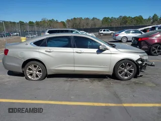 2014 Chevrolet Impala LT with VIN 2G1125S33E9256206, listed as a IAAI auction lot 41829287 with 198,661 mi miles and . Bid and sale history available at DreamBid. Image 14.