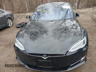 2017 Tesla Model S 100D with VIN 5YJSA1E25HF215778, listed as a IAAI auction lot 41692605 with Not Provided miles and . Bid and sale history available at DreamBid. Image 6.