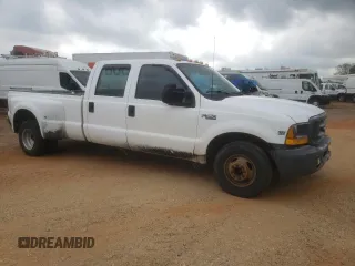 1999 Ford F-350 XL with VIN 1FTWW32FXXEB79284, listed as a Copart auction lot 53969905 with 241,082 mi miles and Salvage title. Bid and sale history available at DreamBid. Image 4.