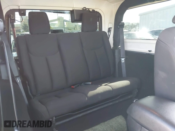 2014 Jeep Wrangler Sport with VIN 1C4AJWAG5EL206565, listed as a IAAI auction lot 42015000 with 90,129 mi miles and . Bid and sale history available at carsss.com. Image 8.