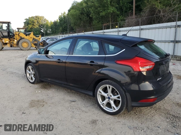 2015 Ford Focus Titanium with VIN 1FADP3N23FL346078, listed as a Copart auction lot 61991195 with 188,014 mi miles and Salvage title. Bid and sale history available at DreamBid. Image 2.