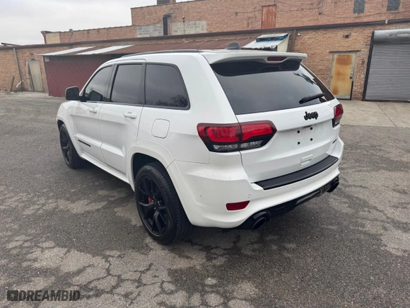 2021 Jeep Grand Cherokee SRT with VIN 1C4RJFDJXMC768325, listed as a Copart auction lot 52925255 with 14,833 mi miles and Clean Title. Bid and sale history available at carsss.com. Image 3.