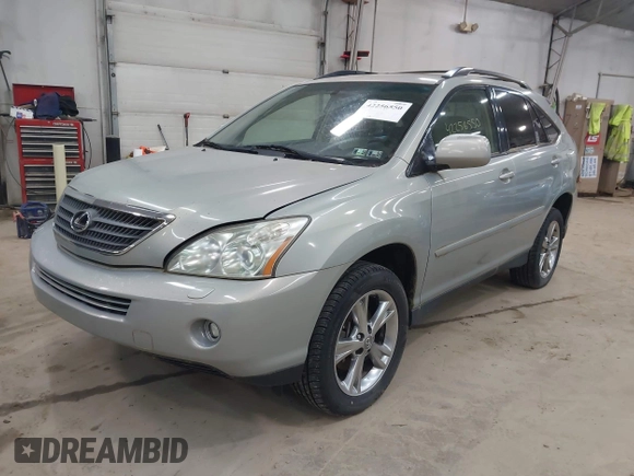 2006 Lexus RX 400h with VIN JTJHW31U960011640, listed as a IAAI auction lot 42256550 with 53,884 mi miles and . Bid and sale history available at DreamBid. Image 2.