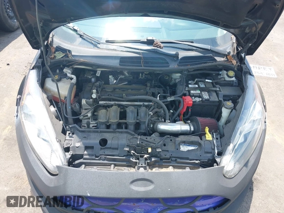 2018 Ford Fiesta S z VIN 3FADP4AJ0JM131607, wystawiony jako IAAI lot #42707624 z przebiegiem 109 815 mil mil oraz . Historia ofert i sprzedaży dostępna na DreamBid. Obrazek 10.