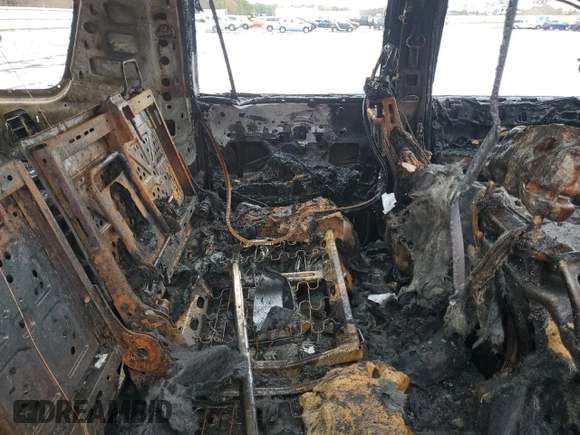 2018 Chevrolet Suburban LT z VIN 1GNSKHKC9JR262273, wystawiony jako Copart lot #51970175 z przebiegiem Nie podano mil oraz Szkoda całkowita • Salvage title. Historia ofert i sprzedaży dostępna na DreamBid. Obrazek 12.