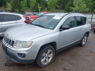 2011 Jeep Compass Latitude with VIN 1J4NF1FB5BD244624, listed as a IAAI auction lot 42093972 with 198,431 mi miles. Bid and sale history available at carsss.com. Image 2.