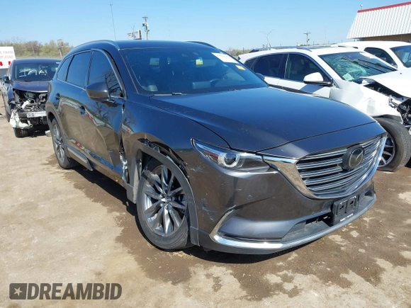 2020 Mazda CX-9 Signature with VIN JM3TCBEY9L0407955, listed as a IAAI auction lot 41984360 with 85,668 mi miles and . Bid and sale history available at carsss.com. Image 1.