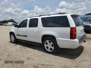 2009 Chevrolet Suburban LTZ with VIN 1GNFC36J89J123398, listed as a Copart auction lot 57942495 with 165,329 mi miles and Salvage title. Bid and sale history available at DreamBid. Image 2.