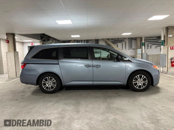 2011 Honda Odyssey EX-L with VIN 5FNRL5H64BB042793, listed as a Copart auction lot 56841615 with 149,454 mi miles and Clean Title. Bid and sale history available at DreamBid. Image 4.