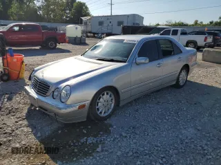 2002 Mercedes-Benz E-Class with VIN WDBJF82J42X077731, listed as a Copart auction lot 70280584 with 169,018 mi miles and Salvage Title. Bid and sale history available at carsss.com. Image 1.