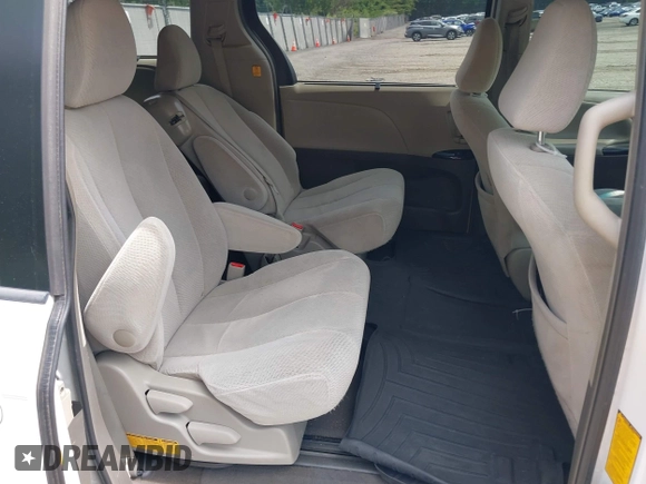 2013 Toyota Sienna LE AAS with VIN 5TDKK3DC6DS351233, listed as a IAAI auction lot 42652981 with 385,791 mi miles and . Bid and sale history available at DreamBid. Image 8.