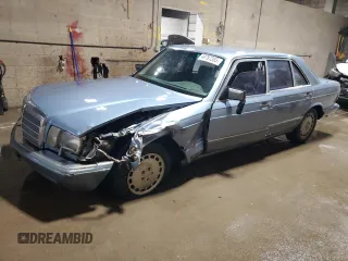 1986 Mercedes-Benz 560 with VIN WDBCA39DXGA213770, listed as a Copart auction lot 49787355 with 218,547 mi miles and Salvage Title. Bid and sale history available at DreamBid. Image 1.