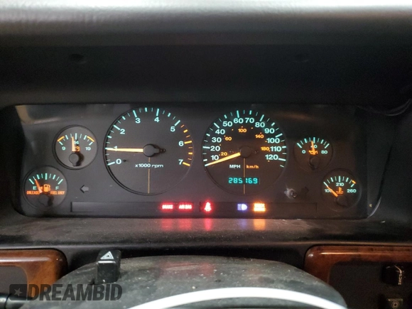 1996 Jeep Grand Cherokee Limited z VIN 1J4GZ78S5TC210710, wystawiony jako Copart lot #81307904 z przebiegiem 285 169 mil mil oraz Szkoda całkowita • Salvage title. Historia ofert i sprzedaży dostępna na DreamBid. Obrazek 9.