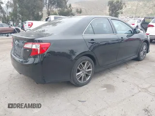 2014 Toyota Camry L with VIN 4T1BF1FK2EU816743, listed as a IAAI auction lot 42047519 with 266,904 mi miles. Bid and sale history available at carsss.com. Image 4.