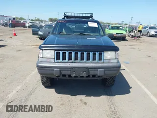 1995 Jeep Grand Cherokee Laredo with VIN 1J4GZ58Y2SC669152, listed as a IAAI auction lot 42077067 with 134,022 mi miles. Bid and sale history available at carsss.com. Image 6.