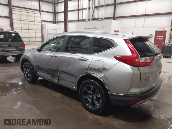 2017 Honda CR-V Touring with VIN 2HKRW2H90HH603307, listed as a IAAI auction lot 41868564 with 81,144 mi miles. Bid and sale history available at carsss.com. Image 3.
