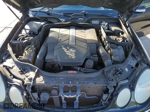 2004 Mercedes-Benz E-Class 5.0L with VIN WDBUF70J64A585084, listed as a Copart auction lot 80297124 with 233,638 mi miles and Salvage Title. Bid and sale history available at carsss.com. Image 11.