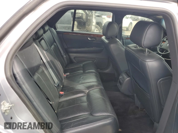 2006 Cadillac DTS 1SC z VIN 1G6KD57Y36U186630, wystawiony jako Copart lot #60792235 z przebiegiem 137 670 mil mil oraz Czysty tytuł • Clean title. Historia ofert i sprzedaży dostępna na DreamBid. Obrazek 10.