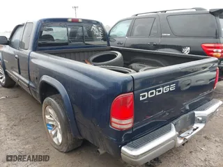 2002 Dodge Dakota SLT with VIN 1B7GL42X72S649714, listed as a IAAI auction lot 41426396 with 227,056 mi miles. Bid and sale history available at carsss.com. Image 3.