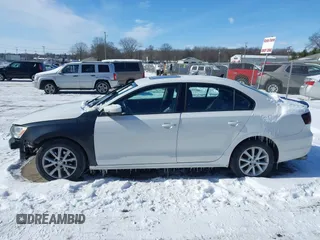 2012 Volkswagen Jetta Sedan SE w/Convenience with VIN 3VWDX7AJ1CM062454, listed as a IAAI auction lot 41580811 with 119,760 mi miles. Bid and sale history available at carsss.com. Image 14.