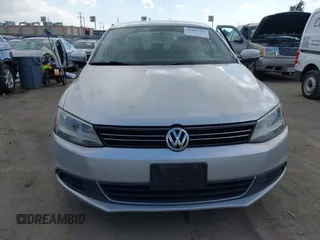 2013 Volkswagen Jetta Sedan SE with VIN 3VWDP7AJ9DM218211, listed as a IAAI auction lot 41493793 with 211,789 mi miles. Bid and sale history available at carsss.com. Image 12.