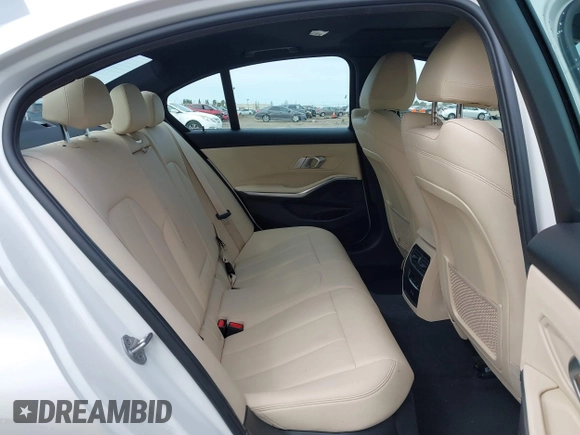 2021 BMW 3 Series 330i z VIN 3MW5R1J08M8C07261, wystawiony jako IAAI lot #41861814 z przebiegiem 87 426 mil mil oraz . Historia ofert i sprzedaży dostępna na DreamBid. Obrazek 8.