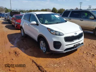 2019 Kia Sportage LX with VIN KNDPM3AC3K7536691, listed as a IAAI auction lot 41733413 with 77,095 mi miles. Bid and sale history available at carsss.com. Image 1.