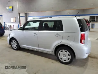 2012 Scion xB with VIN JTLZE4FE4CJ017485, listed as a Copart auction lot 53947535 with 113,979 mi miles and Salvage Title. Bid and sale history available at DreamBid. Image 2.