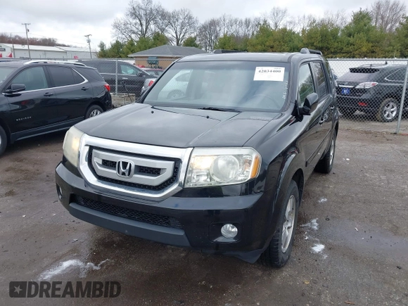 2011 Honda Pilot EX-L with VIN 5FNYF4H51BB080874, listed as a IAAI auction lot 42034400 with 194,080 mi miles and . Bid and sale history available at carsss.com. Image 17.