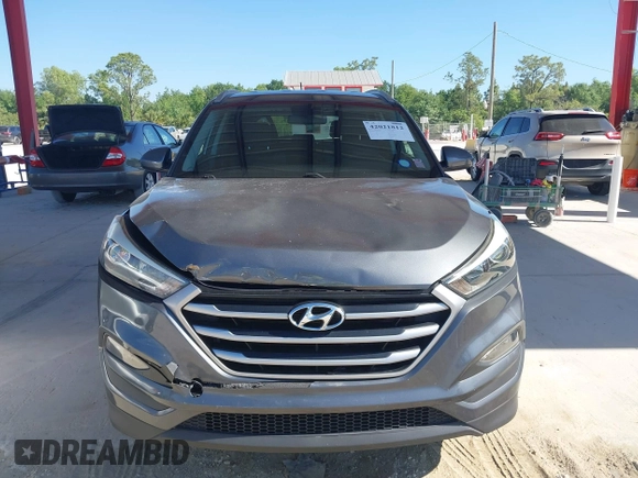 2017 Hyundai Tucson SE with VIN KM8J33A4XHU438510, listed as a IAAI auction lot 42021812 with 117,848 mi miles. Bid and sale history available at carsss.com. Image 12.
