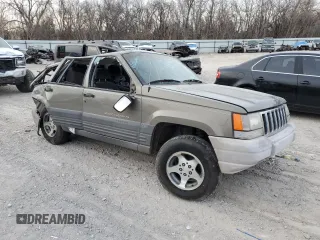 1996 Jeep Grand Cherokee Laredo with VIN 1J4FX58S0TC190128, listed as a Copart auction lot 42830345 with 0 mi miles and Salvage Title. Bid and sale history available at carsss.com. Image 4.