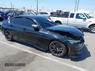 2020 BMW 3 Series 330i z VIN WBA5R1C09LFH43559, wystawiony jako IAAI lot #42224533 z przebiegiem 53 543 mil mil oraz . Historia ofert i sprzedaży dostępna na DreamBid. Obrazek 1.