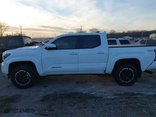 2024 Toyota Tacoma 4WD SR5 with VIN 3TMLB5JN4RM025976, listed as a IAAI auction lot 41073693 with 14,215 mi miles. Bid and sale history available at carsss.com. Image 14.