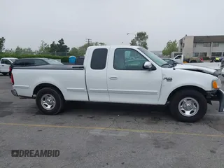 2000 Ford F-150 XL with VIN 1FTRX17L4YNA39407, listed as a IAAI auction lot 42141350 with 82,824 mi miles and . Bid and sale history available at DreamBid. Image 13.