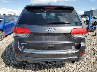 2018 Jeep Grand Cherokee High Altitude z VIN 1C4RJFCG3JC426443, wystawiony jako Copart lot #49703465 z przebiegiem 97 233 mil mil oraz Szkoda całkowita • Salvage title. Historia ofert i sprzedaży dostępna na DreamBid. Obrazek 6.
