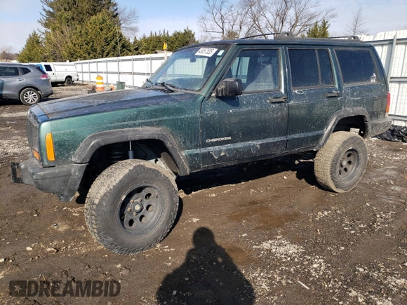 1999 Jeep Cherokee SE with VIN 1J4FF28S3XL551875, listed as a Copart auction lot 43057555 with 226,794 mi miles and Salvage title. Bid and sale history available at DreamBid. Image 1.