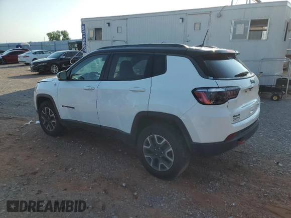 2021 Jeep Compass Trailhawk with VIN 3C4NJDDB2MT583833, listed as a Copart auction lot 58736675 with 67,090 mi miles and Salvage title. Bid and sale history available at DreamBid. Image 2.