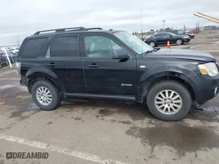 2009 Mercury Mariner Hybrid with VIN 4M2CU29319KJ18127, listed as a IAAI auction lot 41830660 with 273,438 mi miles. Bid and sale history available at carsss.com. Image 13.