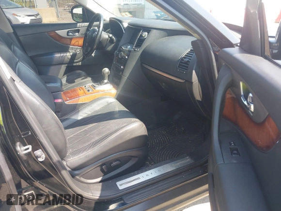2014 Infiniti QX70 with VIN JN8CS1MW7EM410150, listed as a IAAI auction lot 39960321 with Not Provided miles and . Bid and sale history available at DreamBid. Image 5.