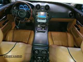 2013 Jaguar XJ with VIN SAJWJ1CD1D8V51462, listed as a Copart auction lot 50527985 with 62,995 mi miles and Salvage title. Bid and sale history available at DreamBid. Image 8.