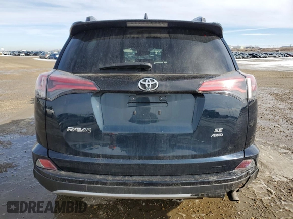 2018 Toyota RAV4 SE with VIN 2T3JFREV3JW806407, listed as a Copart auction lot 48980005 with 70,165 mi miles and Salvage title. Bid and sale history available at DreamBid. Image 6.